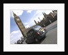 Taxi on road with big ben in background, London by Assaf Frank